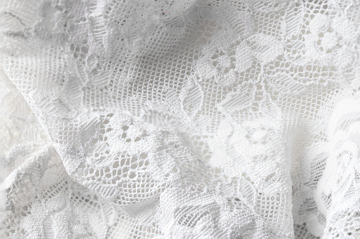 White lace fabric texture for wedding background.