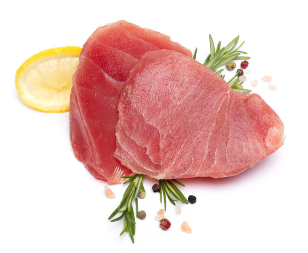 istock Fresh tuna Fish steak isolated on a white background 2044065408