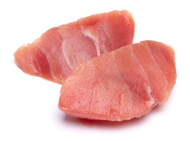 istock Fresh tuna Fish steak isolated on a white background 2044065414