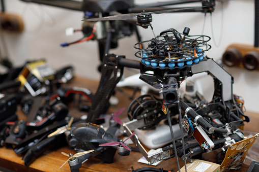 Workshop and repair production quadrocopter drones with parts stuff.