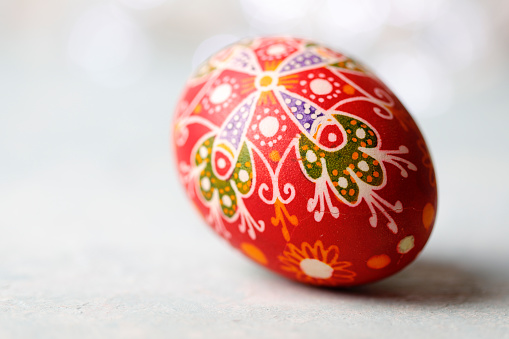 Close -up shot of red hand painted easter egg