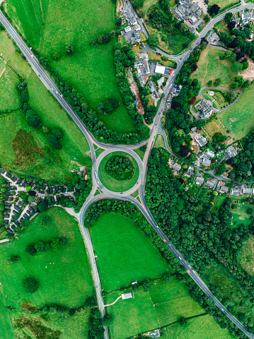 Drone top down view of a busy English roundabout seen in Keswick