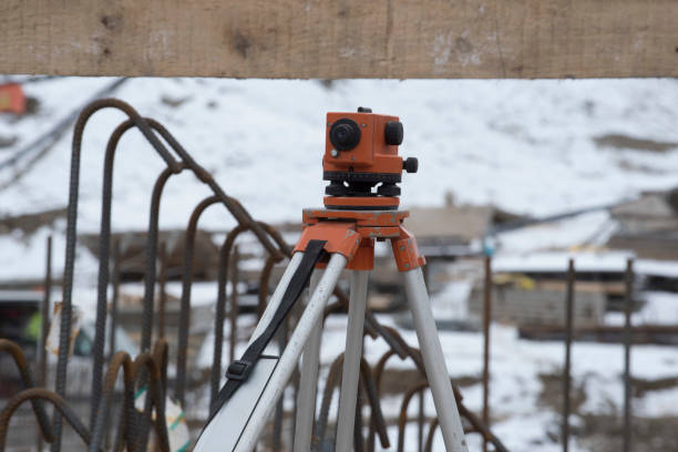 On a sunny day on March 16, 2024, in Shuangliu District, Chengdu, Sichuan Province, a middle-aged male worker was conducting road survey at the construction site