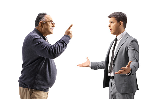 Mature man threatening to a businessmen isolated on white background