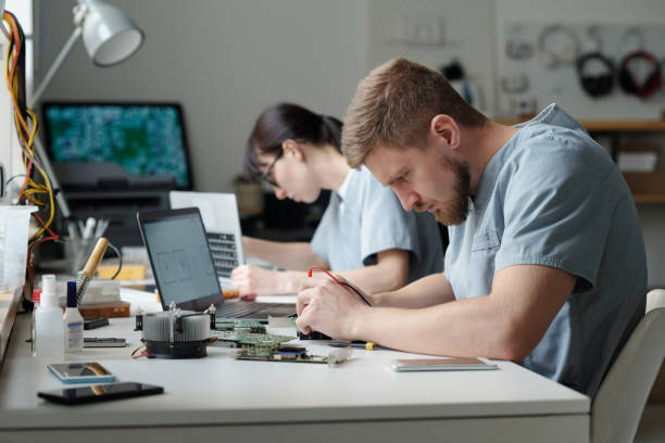 istock Young professional repairing motherboard 2044197965