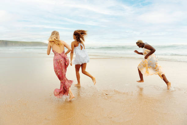 istock three young girls on the beach 2044240562