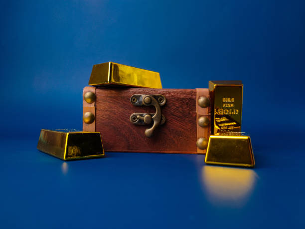 istock Vintage wooden box with gold bar 2044314180