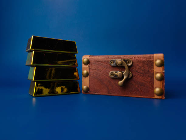 istock Vintage wooden box with gold bar 2044315655