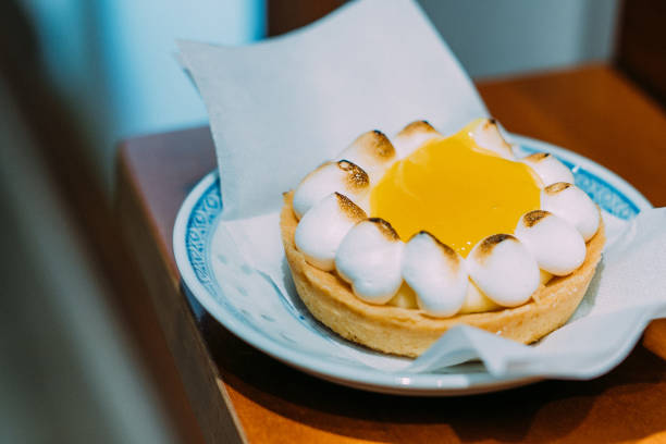 Close-Up Shot of a Sweet & Sour Miniature Lemon Tart Pastry for Dessert. Photographed in Venice, Italy