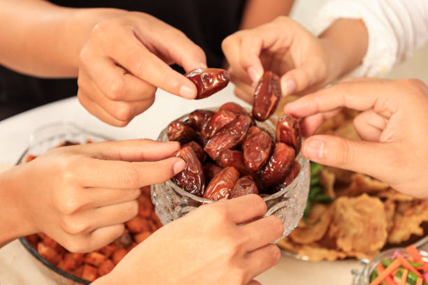istock Breaking the Fast Eating Kurma Dates Fruit 2044432960