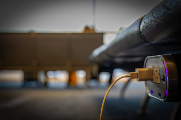 Selective focus on airport terminal phone charging outlet station. High quality photo