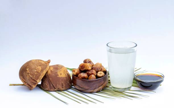 istock Date Palm Jaggery, Phoenix Dactylifera Fruit and Palm Tree Juice Isolate on White Background with Copy Space, Liquid Palm Jaggery 2044465534