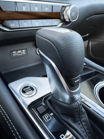 Automatic gearshift stick detail from modern luxury car