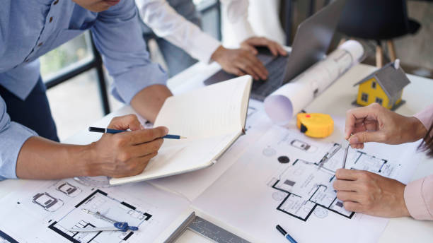 istock Project planning meetings with engineer or architect working together to model home and use engineering tools to create model and blueprint at work. 2044487268