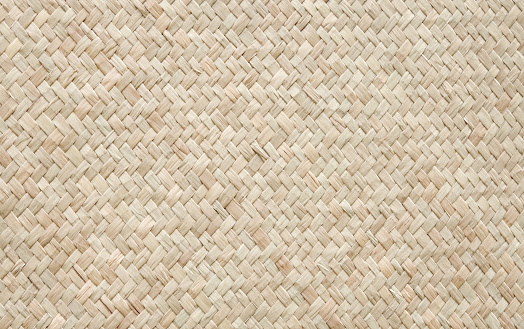 Reed weaving mat texture in natural pattern for background and design art work.