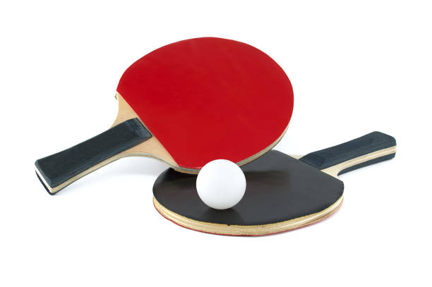 istock Ping pong paddles and balls isolated on white background 2044531865