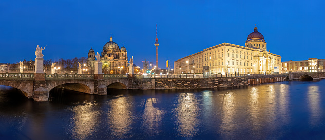 Panorama of the Berlin Cathedral, the TV Tower and the rebuilt City Palace at night