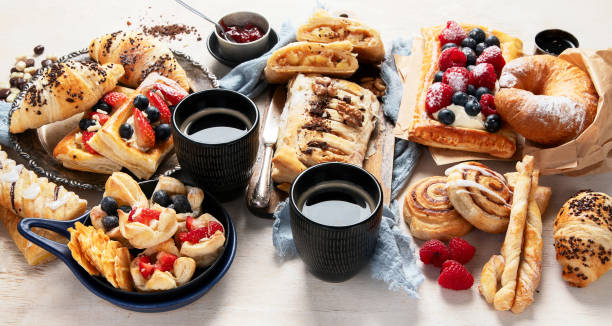 istock Freshly baked pastry. Delicious dessert table. 2044574333