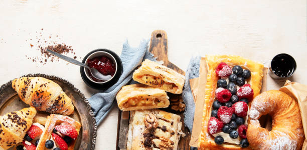 istock Freshly baked pastry. Delicious dessert table. 2044574334