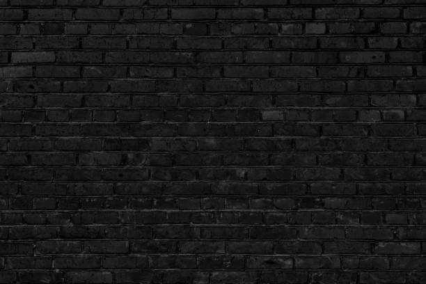 istock Black brick building wall. Interior of a modern loft. 2044577471