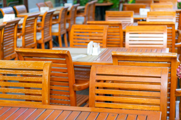 Tables and chairs in a summer cafe on the street.