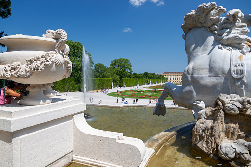Vienna, Austria - June 18, 2023: Fragment of the Neptune Fountain in the Schoenbrunn Palace Park