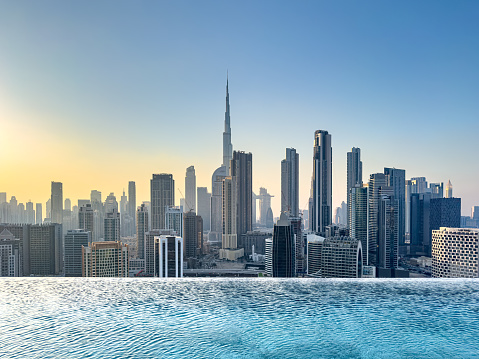 View of Dubai skyline including the Burj Khalifa, the world's tallest skyscraper as seen from Business Bay in Dubai, UAE