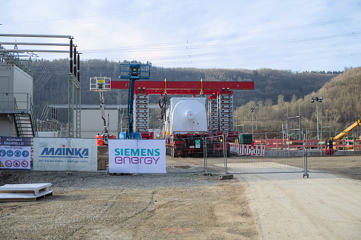 Würgassen, Germany - 02/24/2024: Construction of a rotating phase shifter system for grid stabilization by Siemens Energy at the Würgassen substation grid connection point
