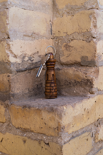 keychain with keys in the form of a tower on a brick wall, Khiva, Uzbekistan