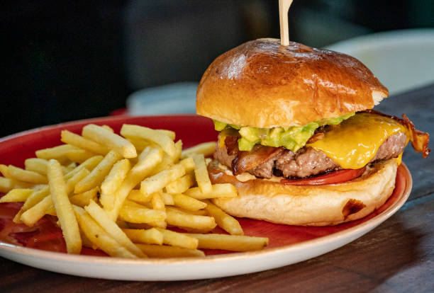 istock Guacamole cheeseburger with french fries 2044732628