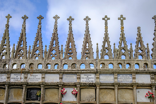 Vilalba, Spain - August 5, 2022: Alba Neo-Gothic Cemetery, with the characteristic pinnacles work of stonemasons from the Terra Cha region since the 16th century.
