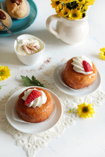 Traditional Italian dessert called Babà. stock photo