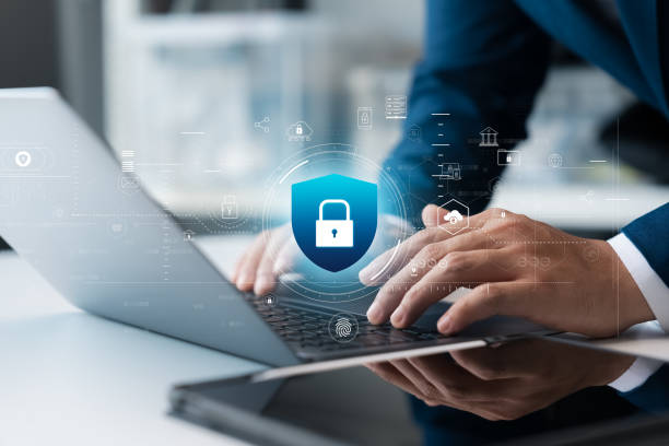 istock Cyber ​​security and data protection, businessman using laptop and tablet Internet network security system, protecting business financial transaction data from cyber-attacks, secure data encryption. 2044794511