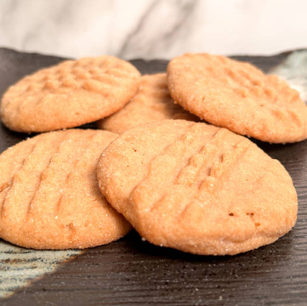 istock Peanut Butter Cookies On A Dark Plate Y 2044811072