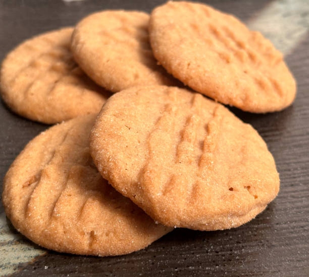 istock Peanut Butter Cookies On A Dark Plate 2044811076