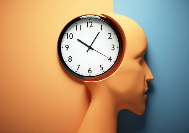 istock Human head profile with clock in place of brain. 2044845311