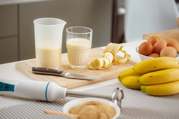 Fresly blended banana smoothie on kitchen counter