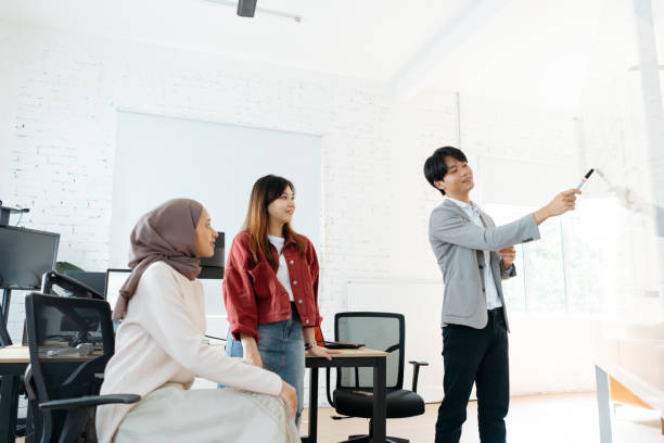istock Young business team meeting in office 2044873374