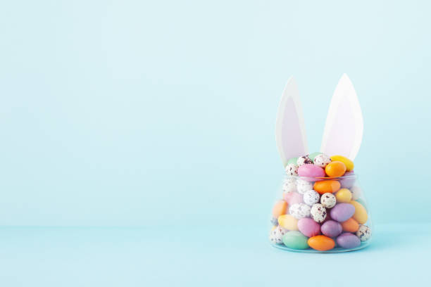 istock Easter candy jar decorated with bunny ears template. 2044885626
