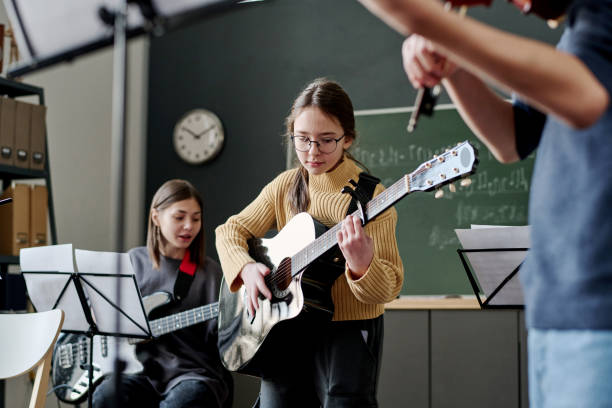 istock Girl Playing In School Band 2044899027