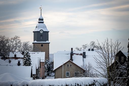 Herleshausen, Hesse, Germany - January 18, 2024: The tower of the church of Herleshausen in Hesse