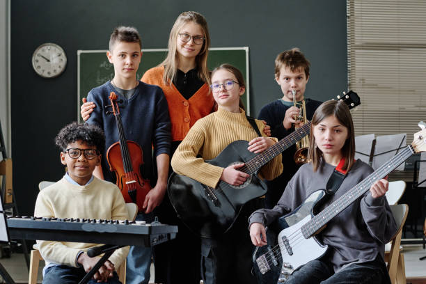 istock Music Teacher And Her Students Group Photo 2044944203
