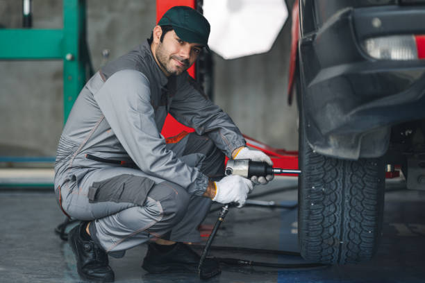 istock Professional automobile maintenance checking car damage broken part condition with clipboard. Diagnostic and repairing vehicles at garage automotive. 2044949540