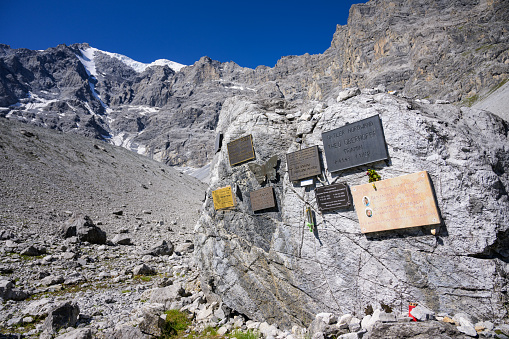 Sulden, Italy - July 09, 2023: Memorial of alpinists in the Ortler Alps near Sulden (South Tyrol, Italy) on a sunny day in summer