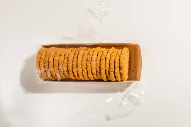istock Cookies, Biscuits Pack on White Background.Pack of biscuits, wrapped with transparent plastic.Studio shot,top view. 2044996583