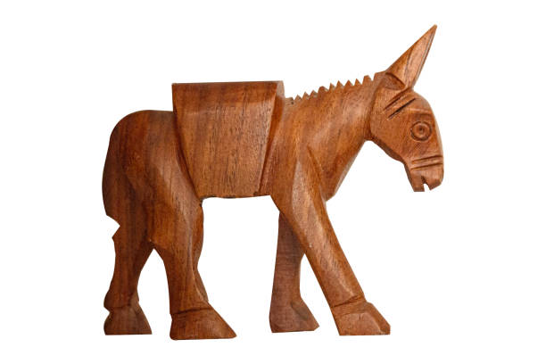 istock Hand Carved Wooden small Donkey isolated on Black background 2045008475