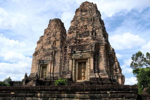 The East Mebon, a 10th Century temple at Angkor, Cambodia. Built during the reign of King Rajendravarman, it stands on what was an artificial island at the center of the now dry East Baray reservoir.