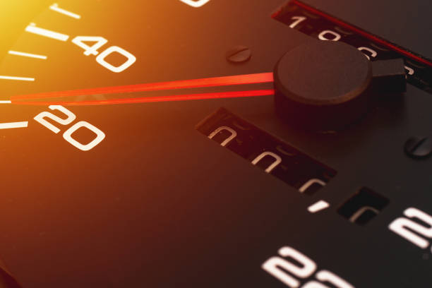 Speedometer in a car. Car dashboard. Dashboard details with indication lamps.Car instrument panel. Dashboard with speedometer.Car detailing. Modern interior.Closeup.Copy space.