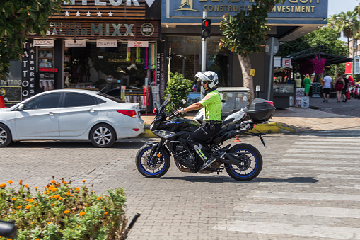 Turkey (Turkiye), Alanya, 10.09.2023: Turkish policeman on a motorcycle in Alanya.