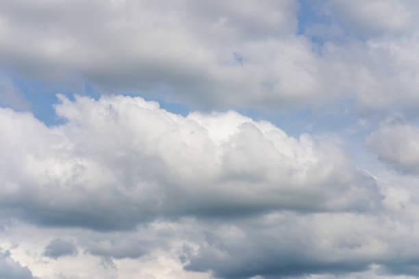 istock beautiful sparse clouds in the blue sky.Cloudscape.Sunny day. blue sky background with a tiny clouds.Cumulus cloud. 2045076064